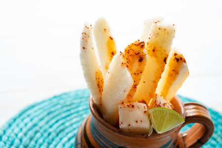 Fresh jicama with chili powder