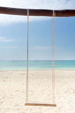 Swing set on mexican beachの写真素材