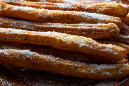 Traditional churros with sugar and cinnamonの写真素材