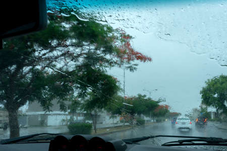 Windshield view on a gray rainy day