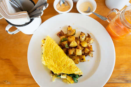 Brunch omelettes with potatoesの写真素材