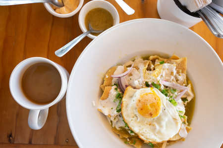 Mexican green chilaquiles for breakfastの写真素材