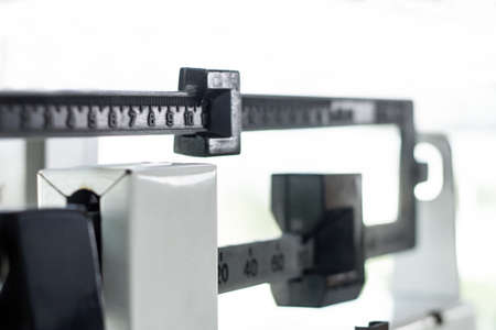 Human weighing machine in gymの写真素材
