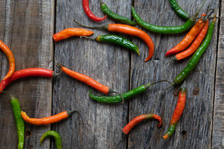 Colorful tree chili on wood background