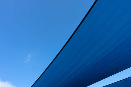 Blue car parking shadesの写真素材