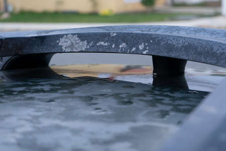 Damaging car with rust and wetの写真素材