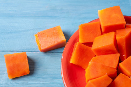 Cubes of tasty and juicy papayaの写真素材