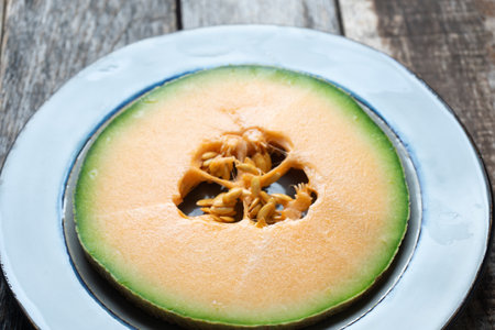 sweet and tasty cantaloupe melon fruit cuttedの写真素材