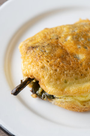 Traditional mexican stuffed chili pepper "filled" on wooden backgroundの写真素材