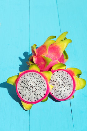Cutted dragon fruit on blue backgroundの写真素材