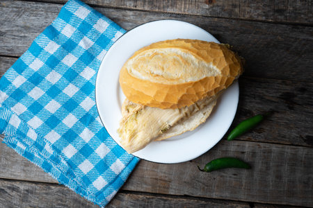 Traditional mexican green tamal sandwich also called "guajolota"の写真素材