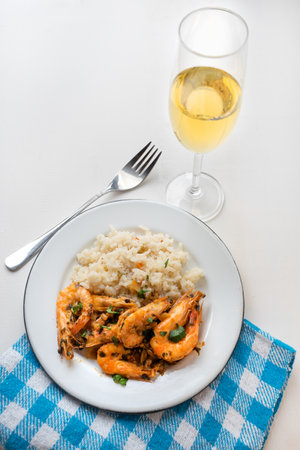 Traditional garlic shrimp also called "al ajillo" with riceの写真素材