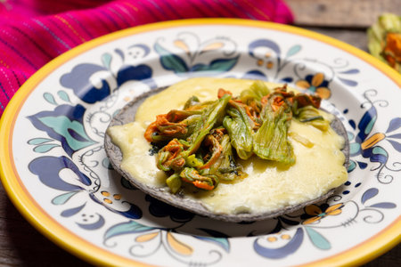 Traditional mexican quesadillas with squash blossom on wooden backgroundの写真素材