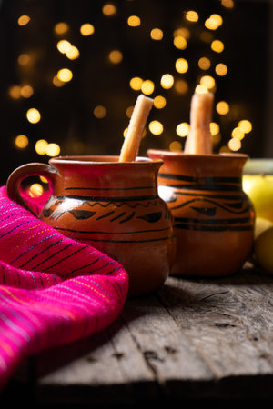 Traditional mexican hot christmas punch also called "ponche" with fruitsの写真素材