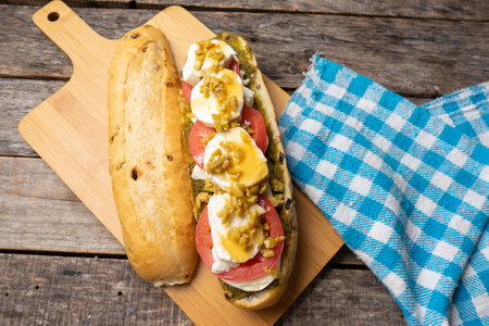 Traditional goat cheese and honey sub sandwich on wooden backgroundの写真素材