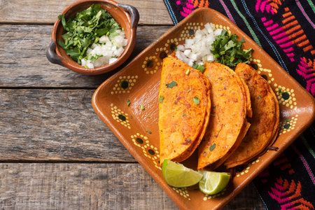 Traditional mexican beef barbecue tacos on wooden backgroundの写真素材