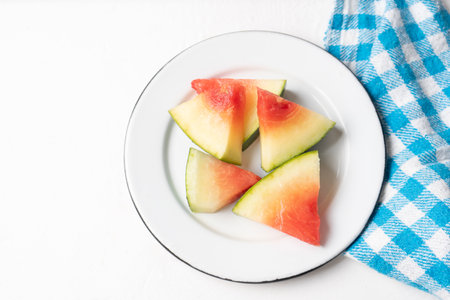 Fresh watermelon fruit slice on white backgroundの写真素材