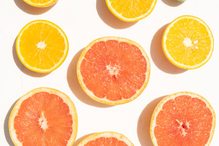 Group of citrus fruits rich in vitamin c on white background