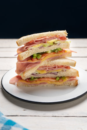 Healthy ham sandwich with cheese on white backgroundの写真素材