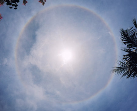Sun halo phenomenon at the blue sky