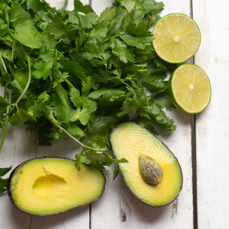 Traditional mexican ingredients for guacamole sauce on white backgroundの写真素材