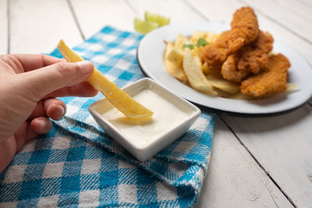 traditional british fish and chips on white backgroundの写真素材