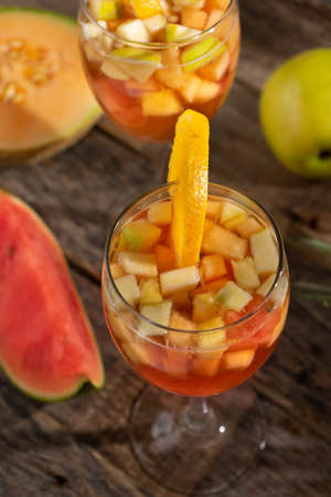 Cold sangria cocktail with wine and fresh fruitの写真素材