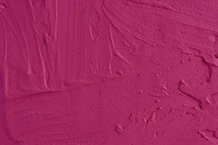 Pink irregular plaster background and texture