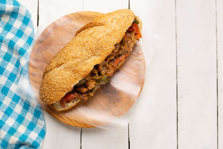 Traditional philly cheese steak with bell pepper on white backgroundの写真素材