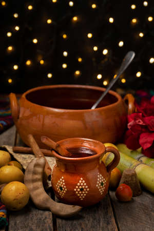 Traditional christmas fruit punch on a wooden backgroundの写真素材