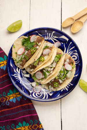 Slow cooked beef barbecue tacos. traditional mexican food