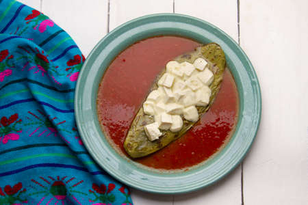 Grilled nopales with cheese and red sauce. traditional mexican foodの写真素材