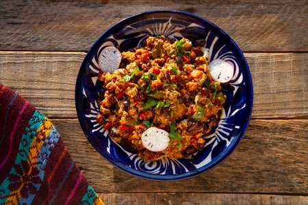 Chilli con carne in talavera plate. traditional mexican foodの写真素材