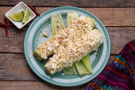 Mexican street food; Elotes with mayonnaise, cheese and chili powderの写真素材