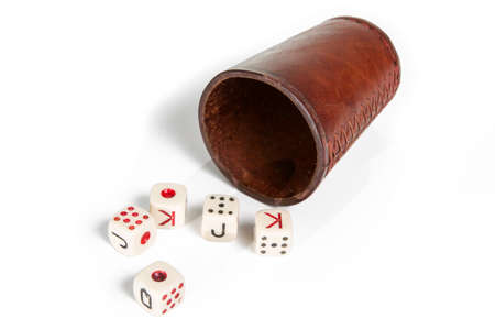 Old Beaker With Dices Isolated on Whiteの写真素材