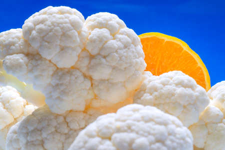 Vegetable Storm. Cauliflower and Orangeの写真素材