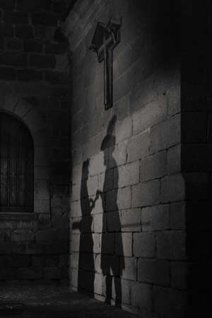 Shadows of Medieval Couple in Avila, Spain.の写真素材