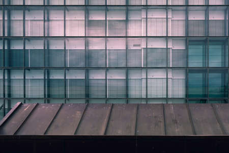 Modern building facade with reflections and colours.の写真素材