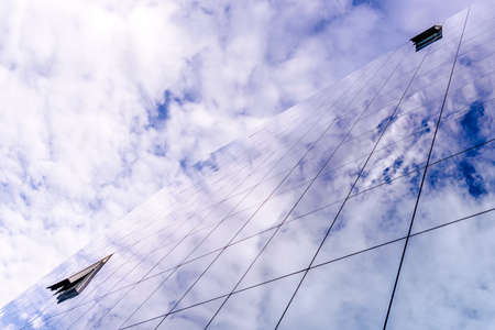 Modern building facade with reflections and colours.の写真素材