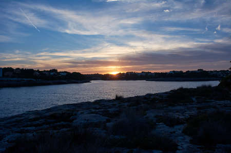 Village of Porto petro, Majorca, Balearic Islands, Spain, Europe,at night as seen from a sailboat in the Marinaの写真素材