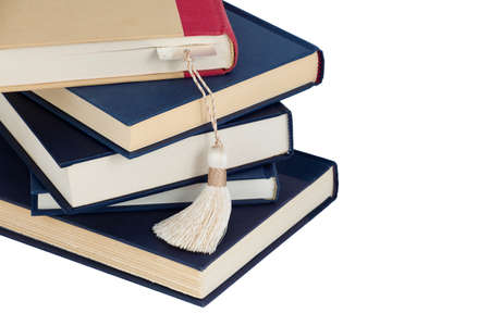A stack of books and a bookmark