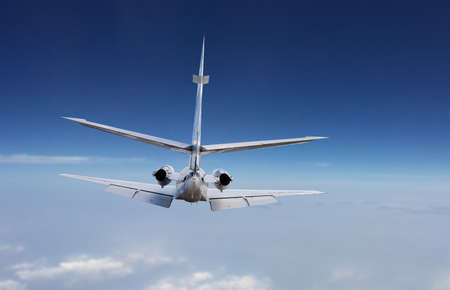 Rear view of a private jet landingの写真素材