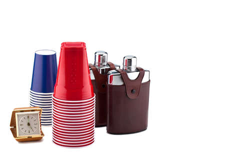 A clock, cups and flasksの写真素材