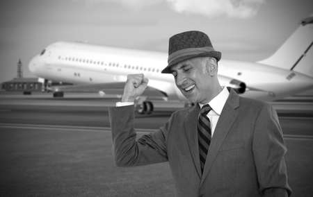 Happy business man at the airport  Image ID: 189537569