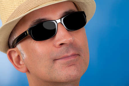 Close up of a handsome man in sunglassesの写真素材