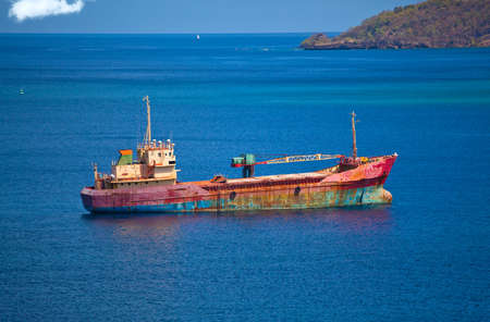 Abandoned cargo ship in the ocean