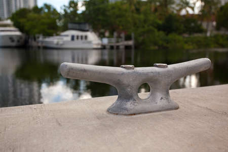 Metal cleat on a concrete dockの写真素材