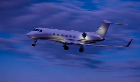 Side view of a private jet flying