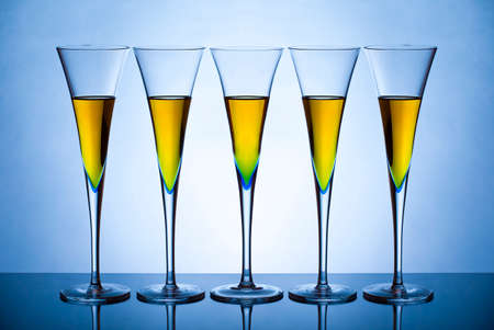 Five champagne glasses back litの写真素材