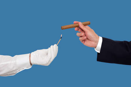 Hand holding a cigar